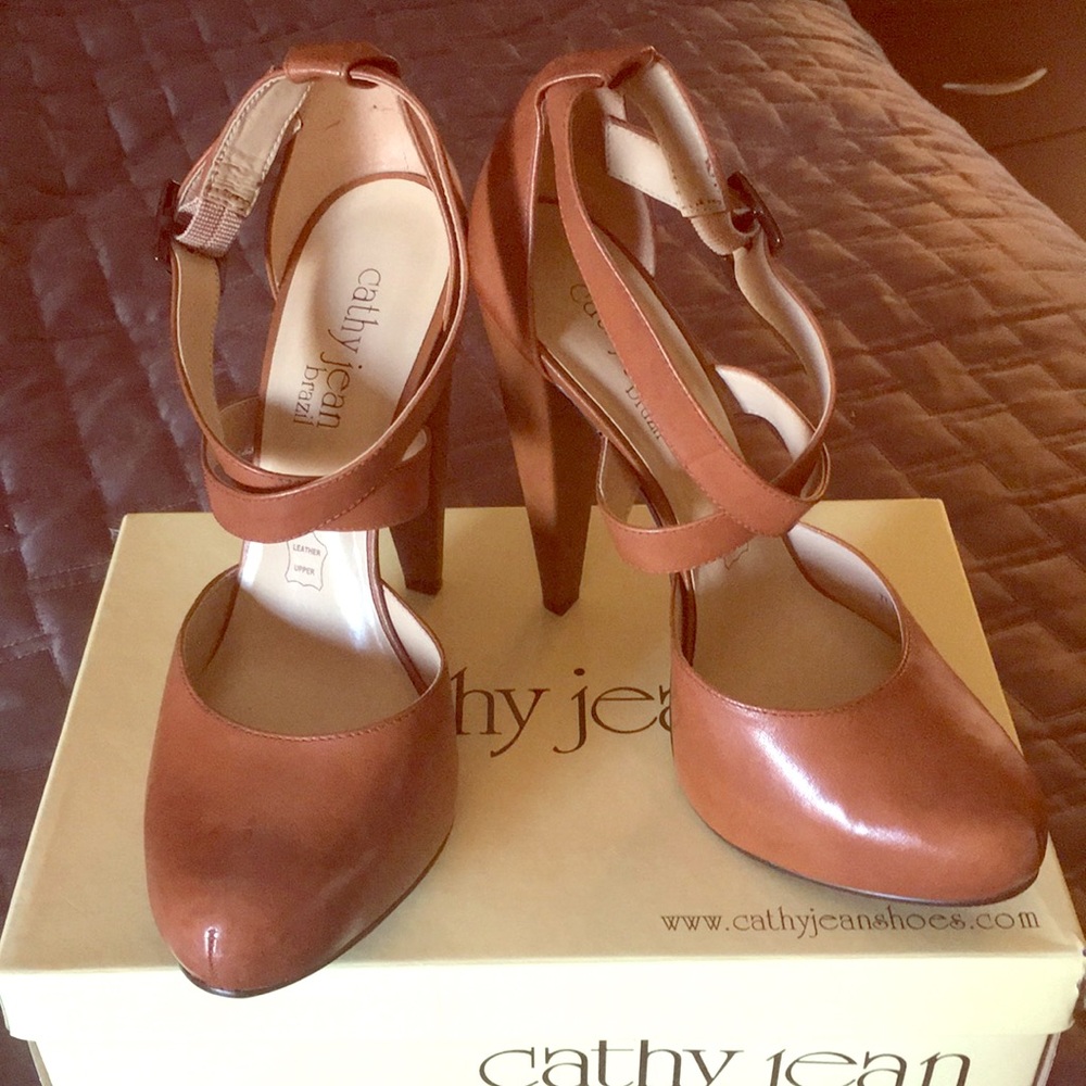 Brown leather closed toe heels